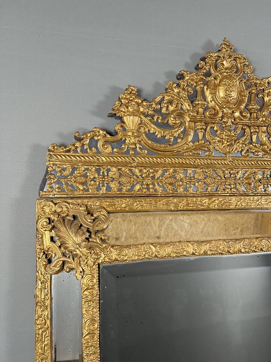 Large antique gilded metal mirror, 19th century