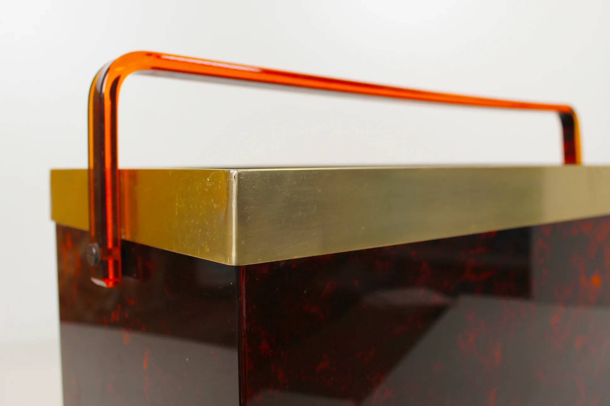 Italian magazine rack in 'faux tortoiseshell' and brass
