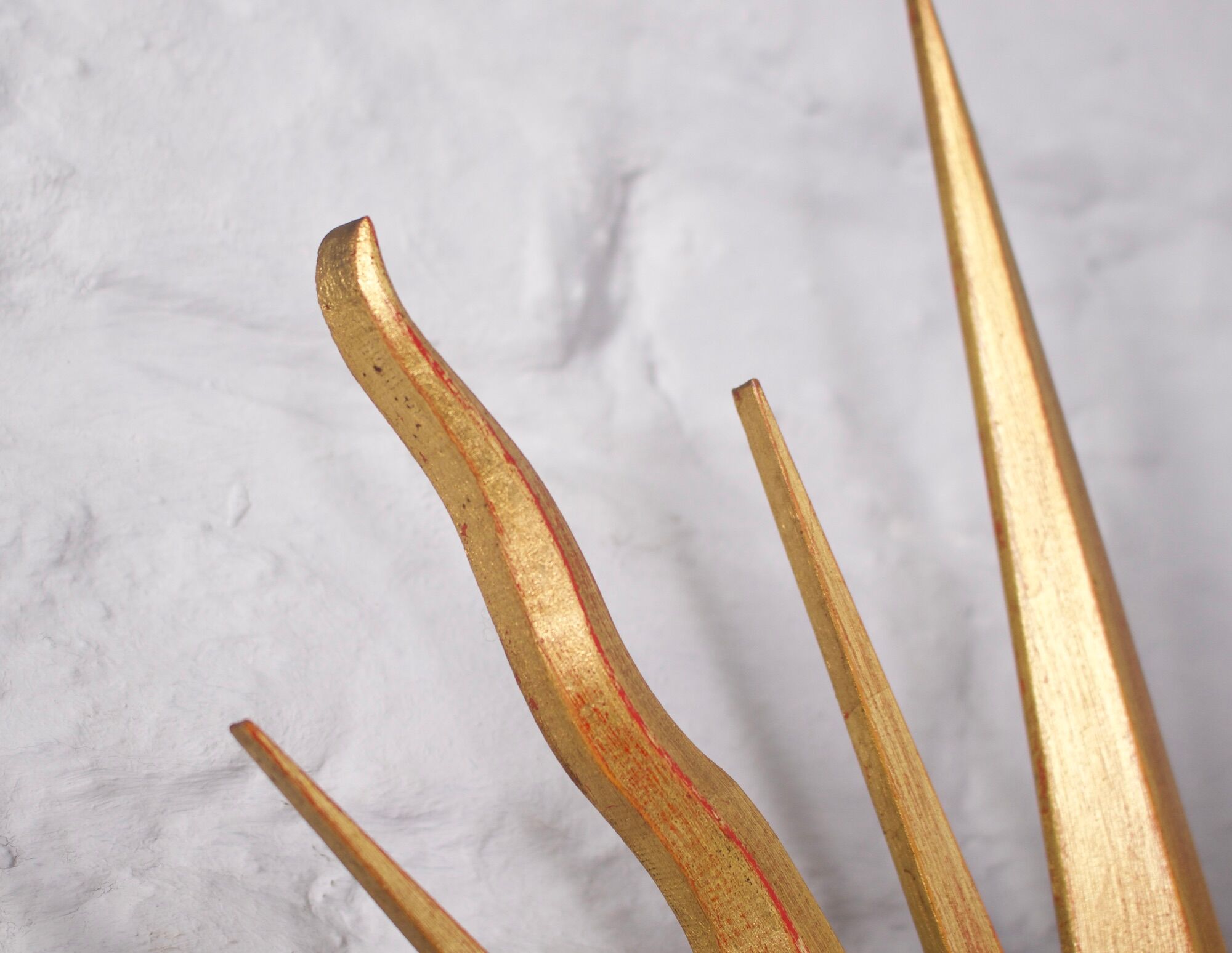 Sun mirror in gilded wood