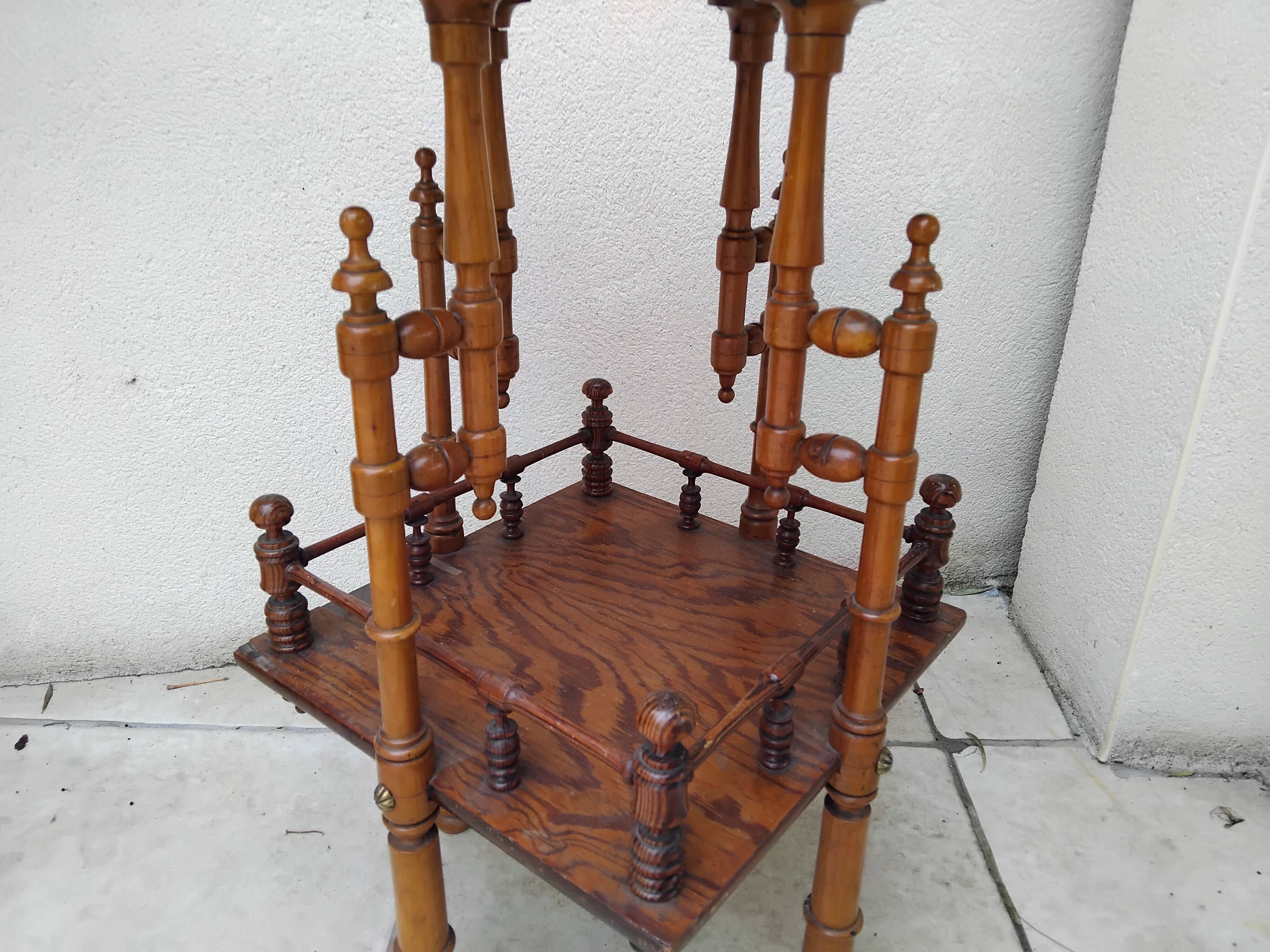 Antique pedestal table in Asian Japonese style.