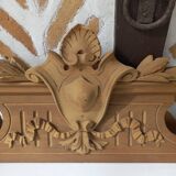 Old sandblasted wooden pediment