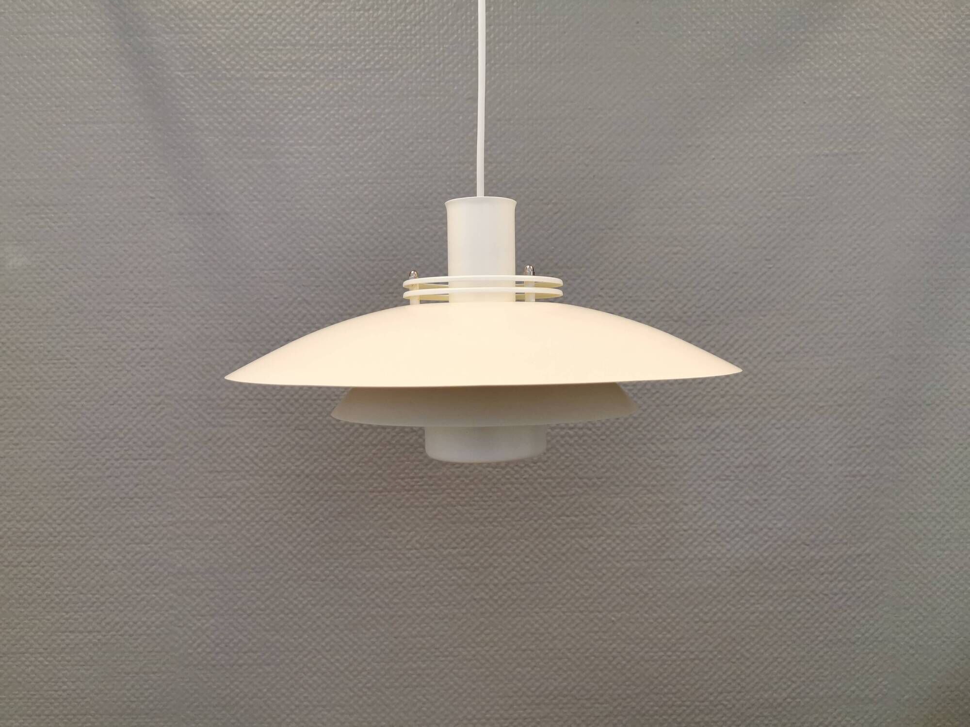 FormLight hanging lamp with multiple layers of shades, a Danish quality product from the 80s.