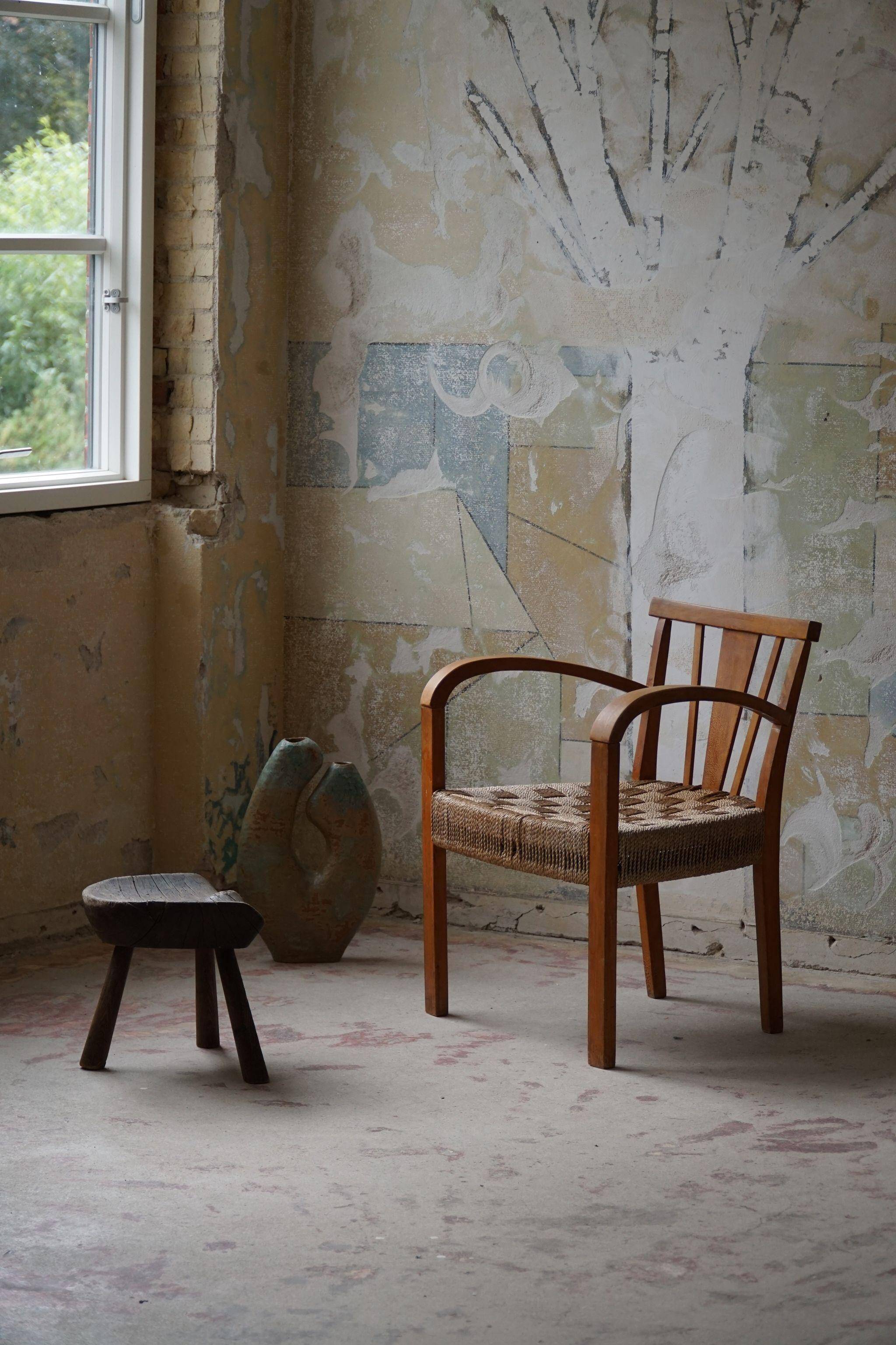 Modern Danish lounge chair in beech and paper cord, in the style of Frits Schlegel.