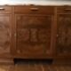 Low sideboard from the beginning of the twentieth century in walnut.