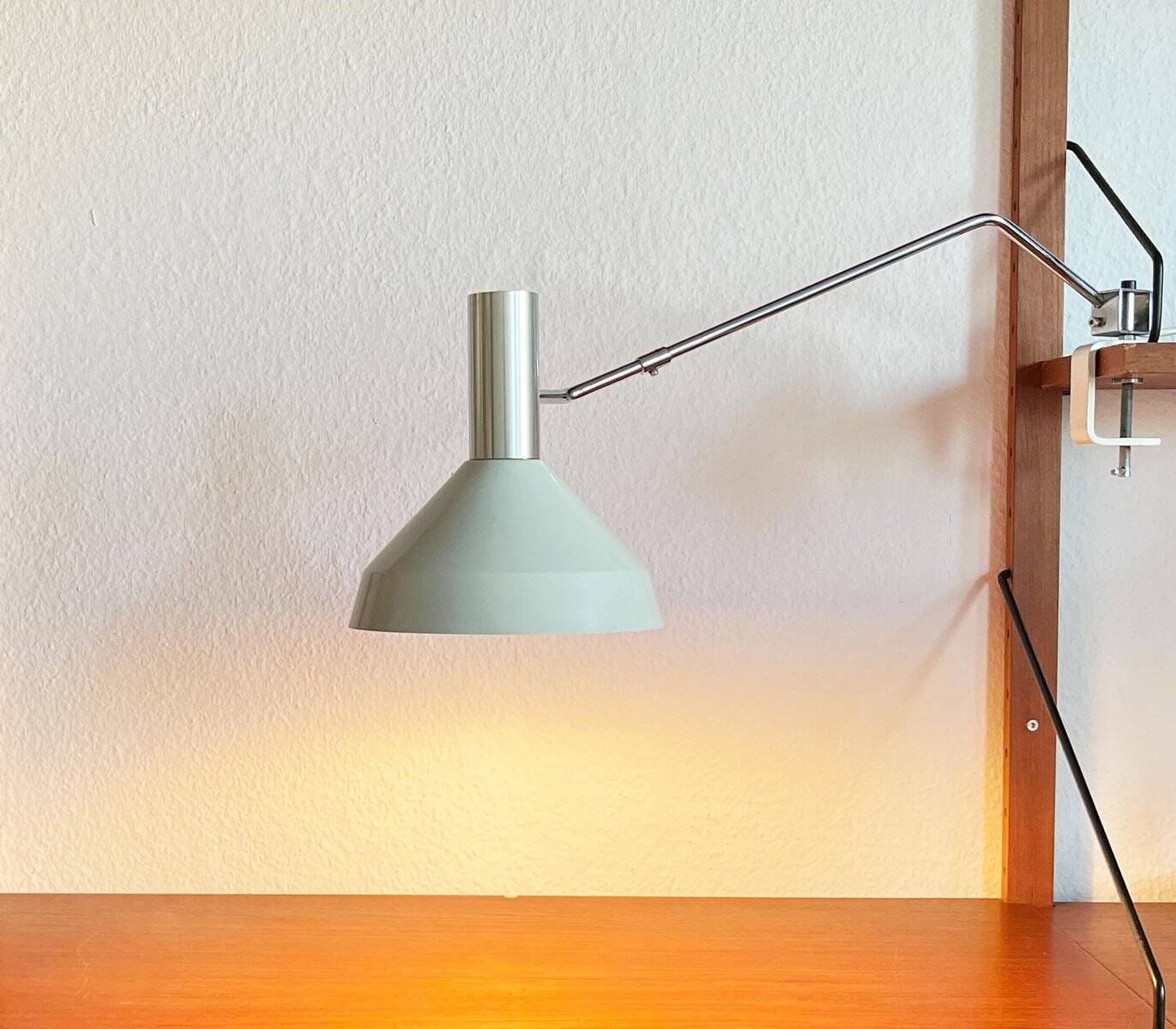 Mid-century minimalist Swiss table lamp with a clamp by Rosemarie and Rico Baltensweiler for Baltensweiler, 1950s.