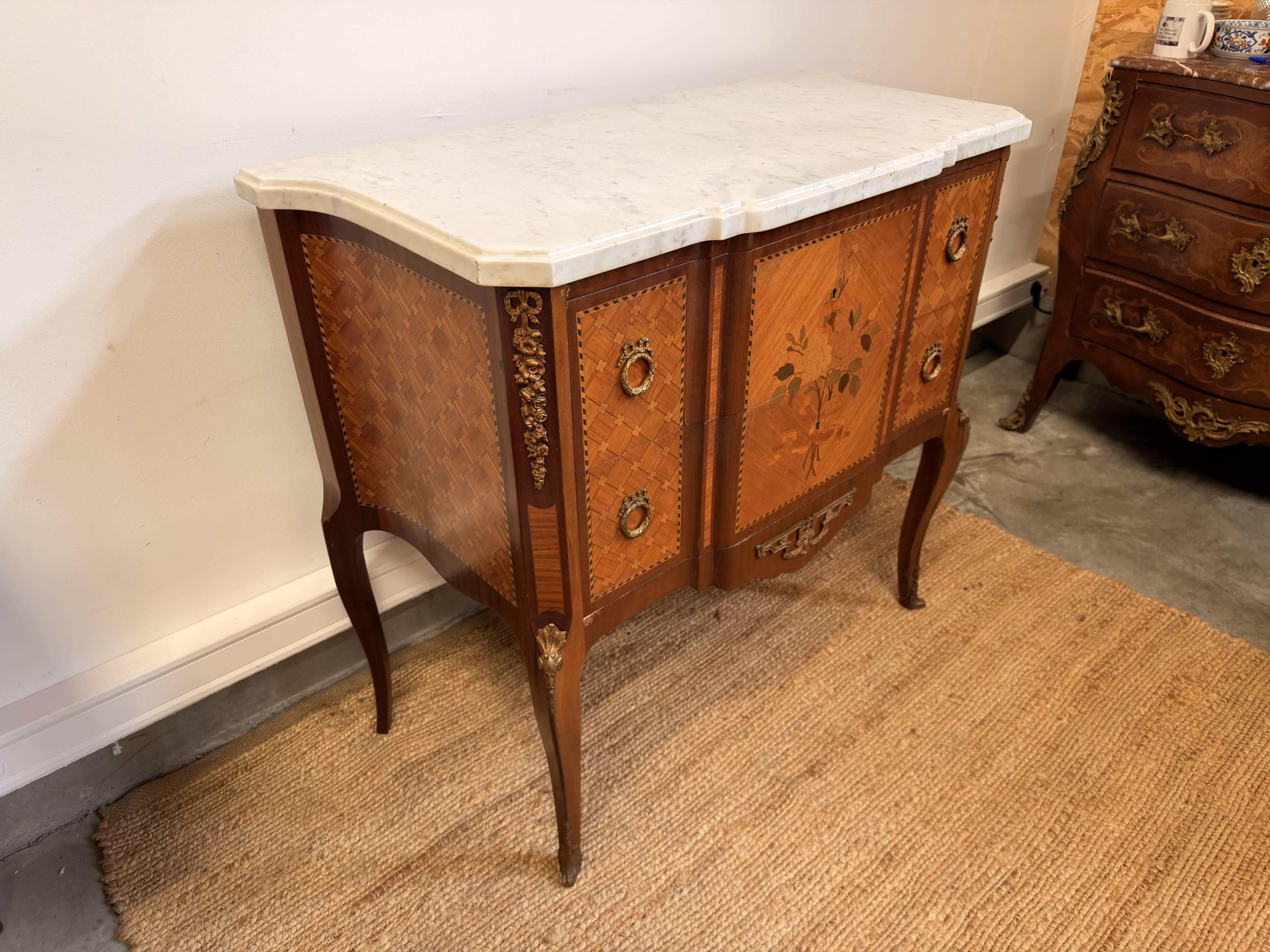 Commode Transition stamped by François Daidé, with a white marble top.
