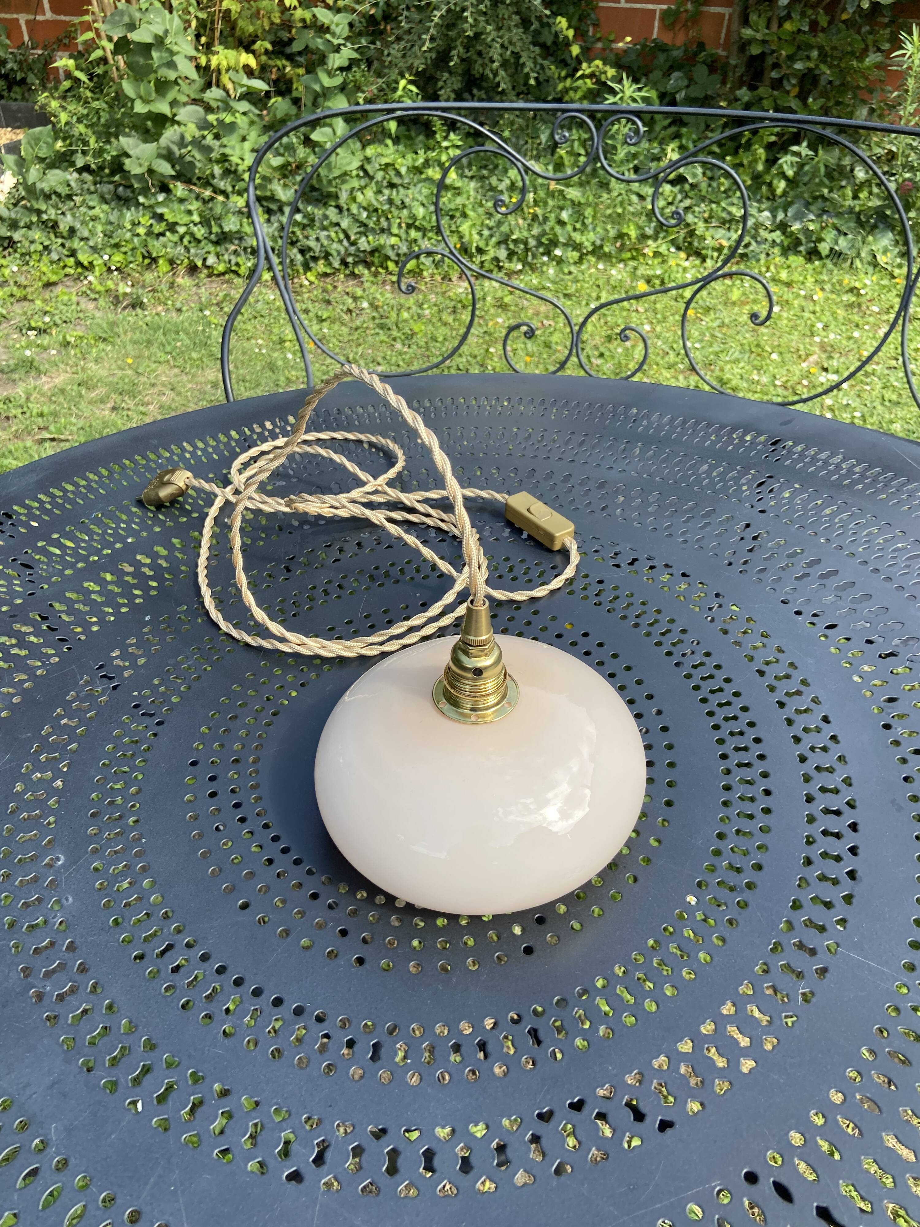 Vintage powder pink opaline globe player 1950