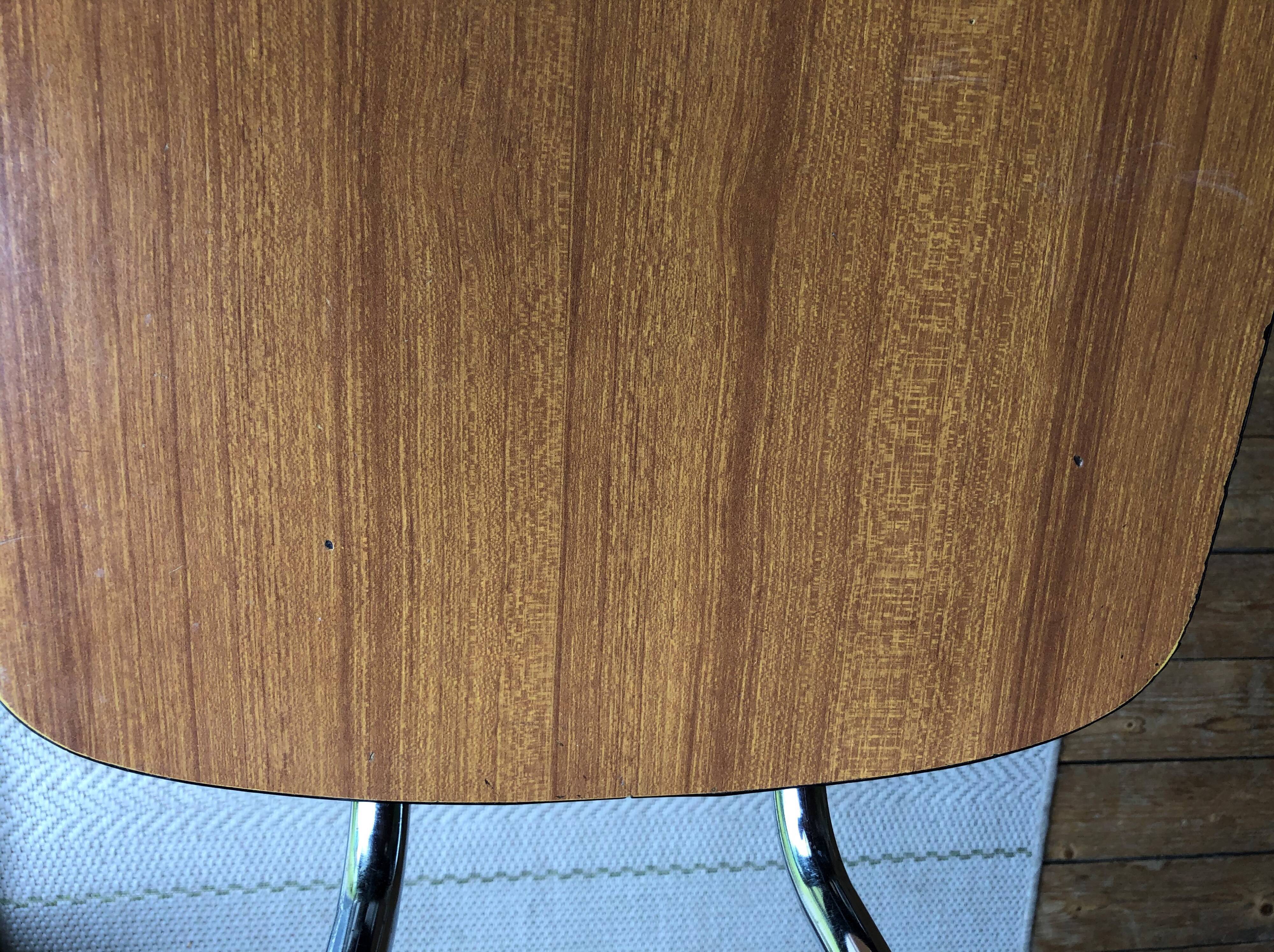 Duo of chairs in formica imitation brown wood and eiffel feet