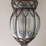 Glass suspension in cage