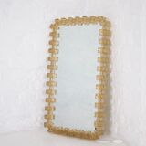 Large luminous acrylic mirror.