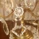 Four-candle girandole in bronze and crystal, early 20th century.