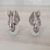 Two frosted glass swan salt cellars with silver plating.
