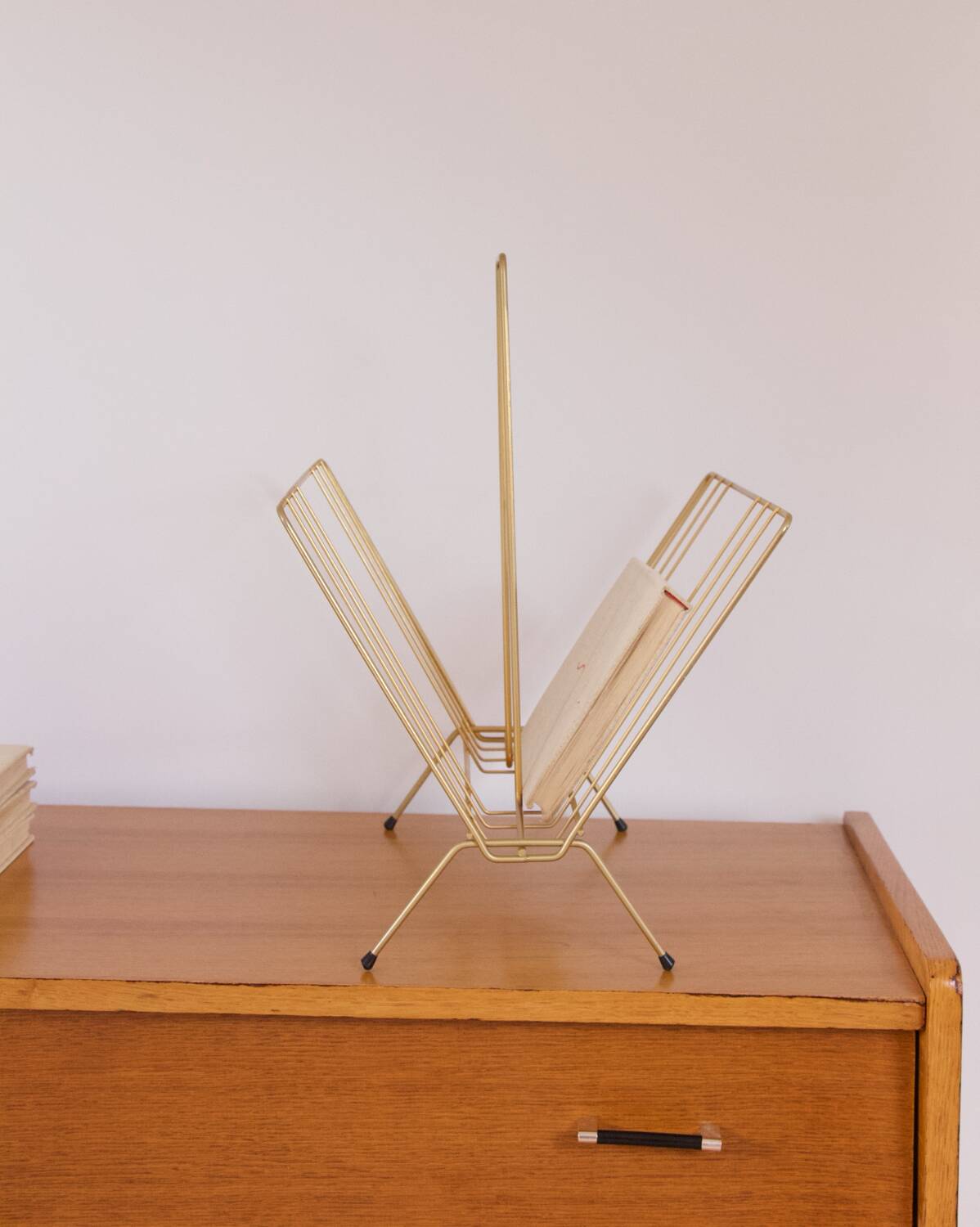 Vintage golden magazine rack