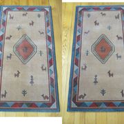 Pair of 60 x 120 Peruvian wool rugs
