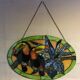 Art Deco style stained glass window representing a couple of toucans