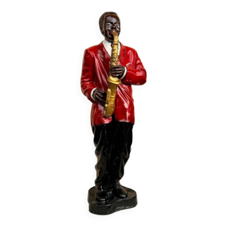 Large black and red jazz figurine in fibreglass, decorative sculpture from the 1960s.