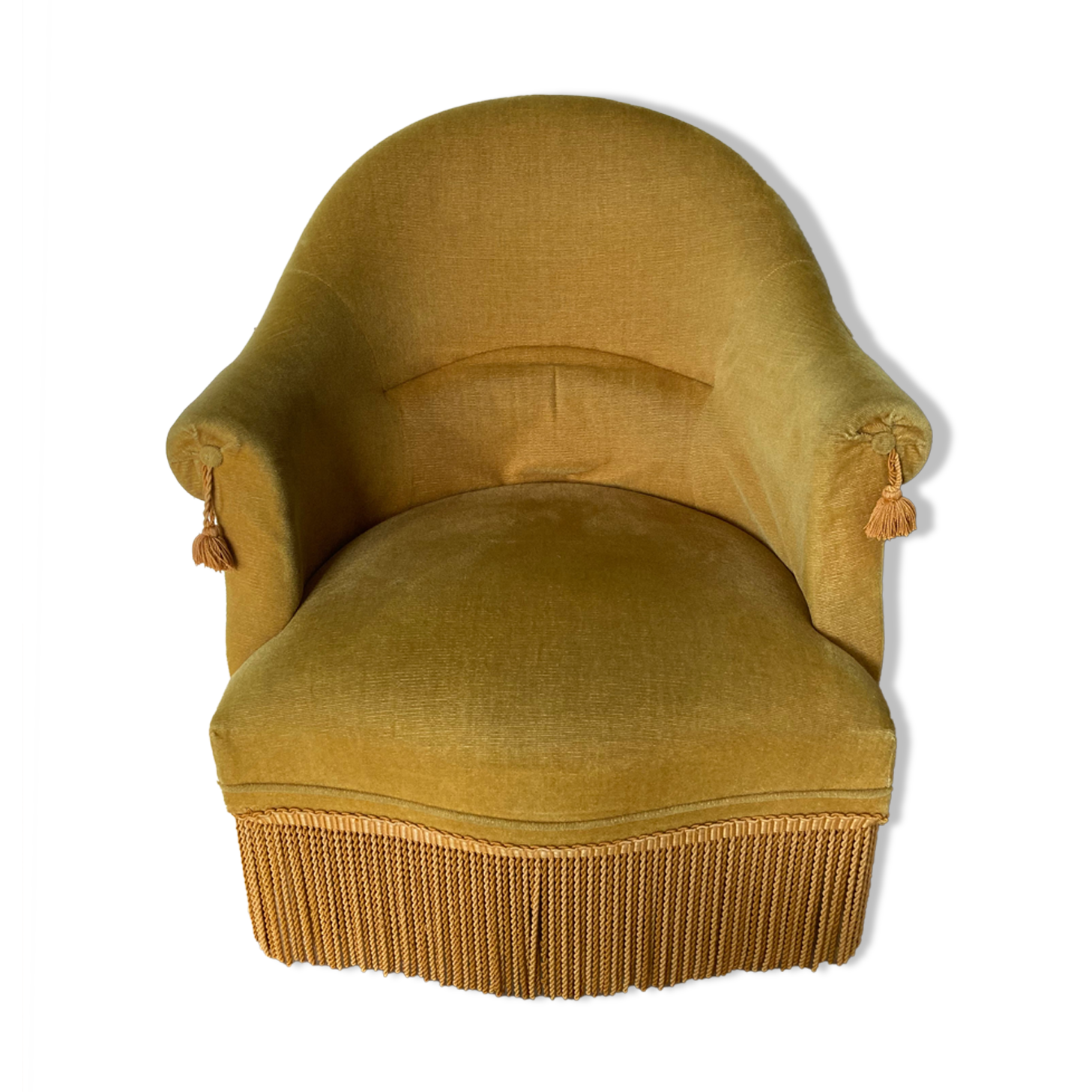 Velvet armchair with fringes