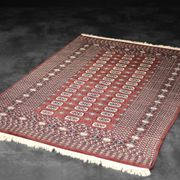 Handwoven red Boukhara oriental rug, 1960s