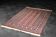 Handwoven red Boukhara oriental rug, 1960s