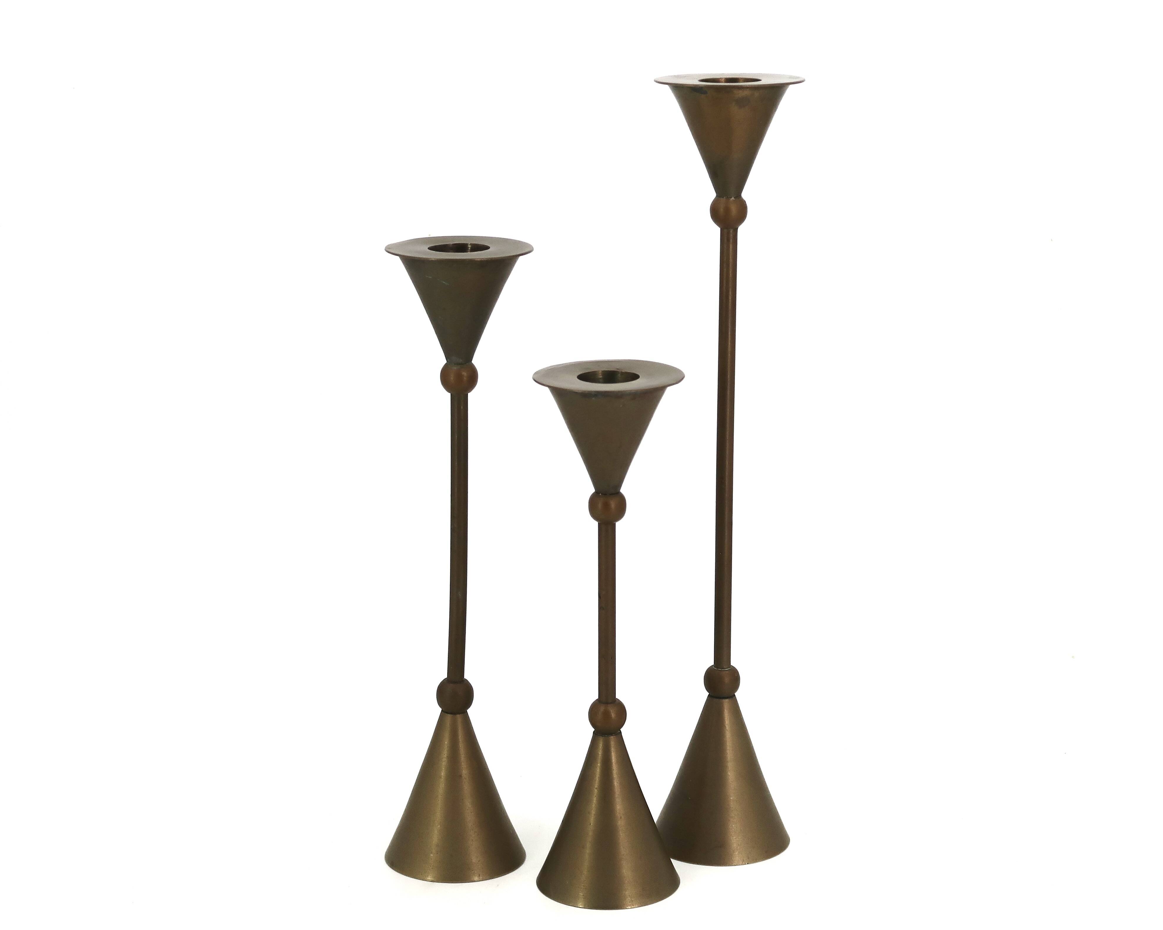 Brass candle holder trio by Christian de Beaumont, 1970s.