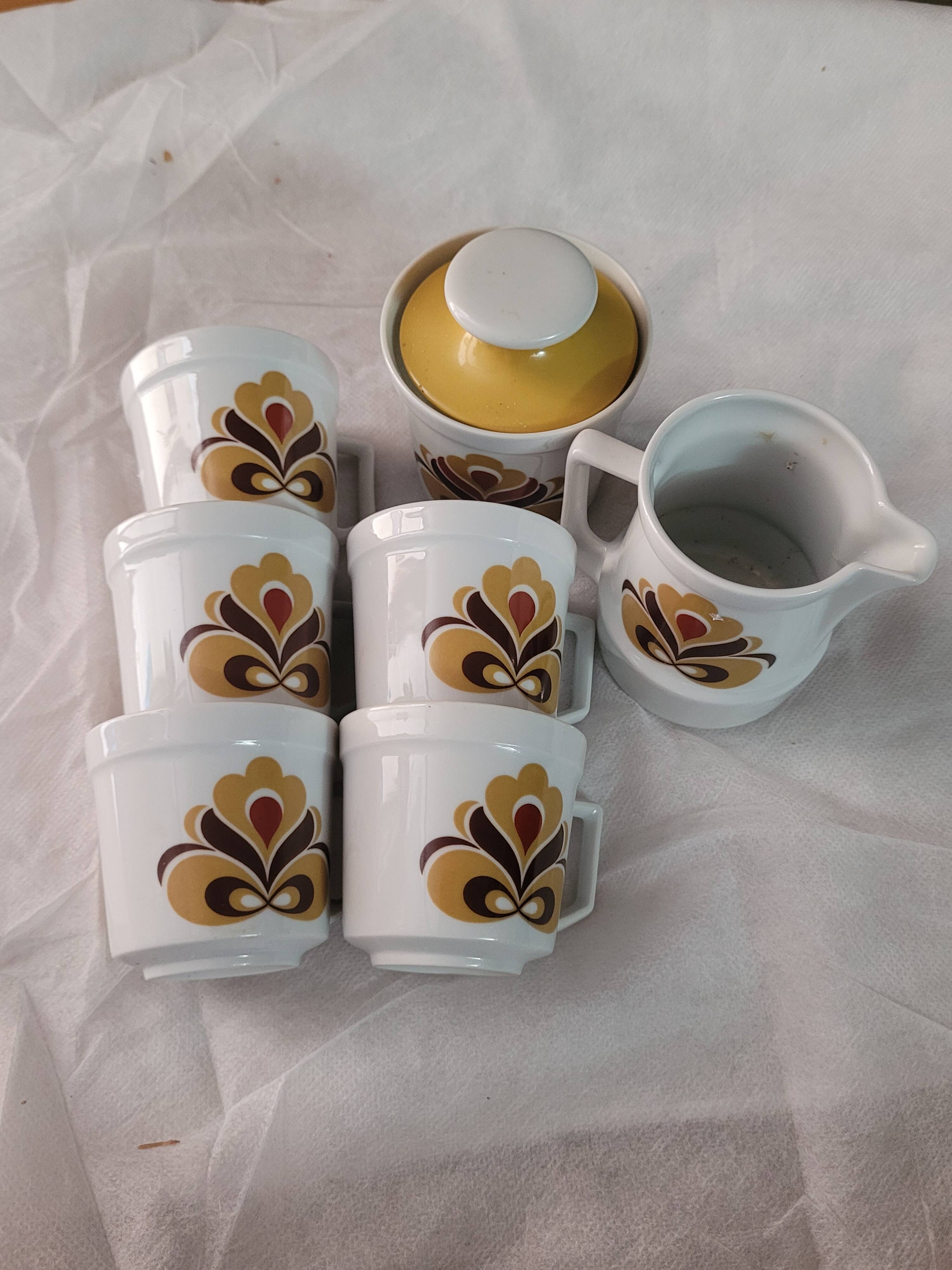 Set of coffee cups and serving pieces