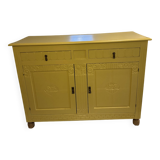 Yellow wooden chest of drawers