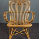 Rattan armchair with armrests by Rohé Noordwolde