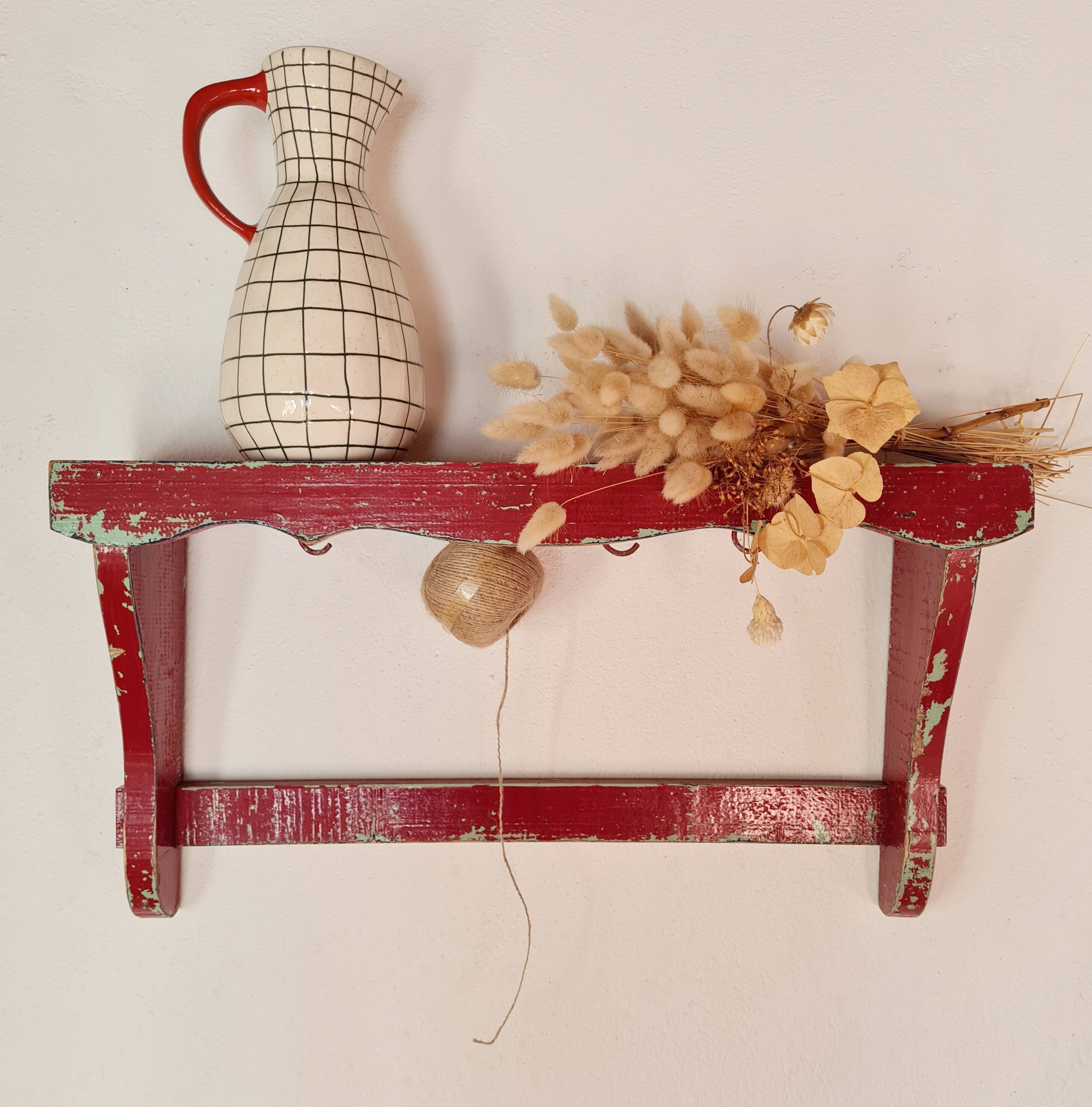 Wall shelf in garnet red wood