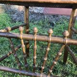 Pair of caned chairs in gilded wood