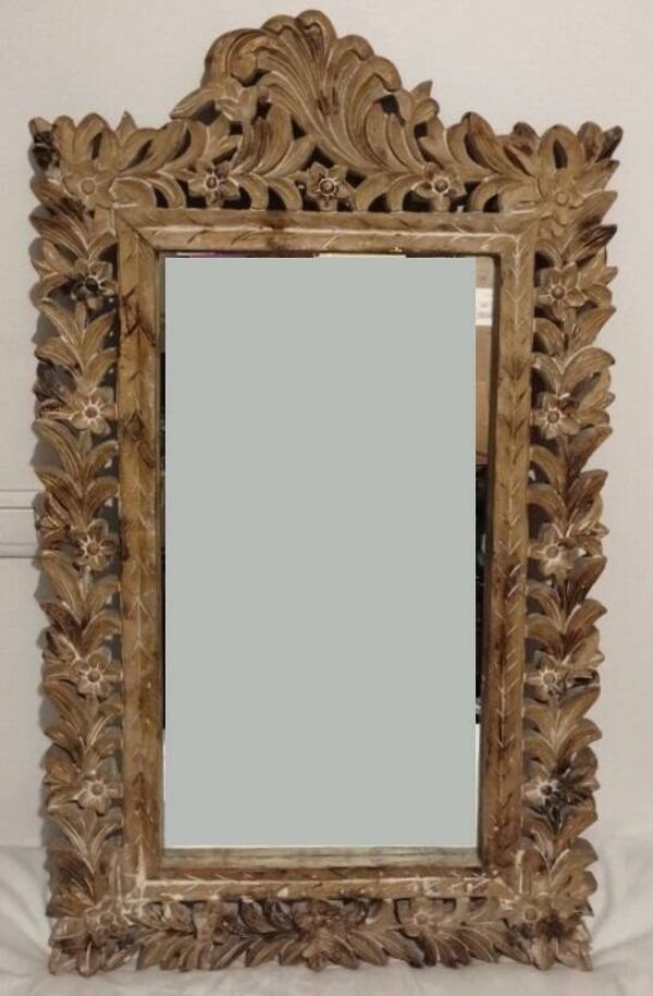 Miroir avec son cadre ajouré
