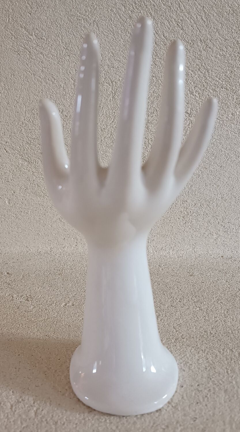 Ring holder, vintage vase in the shape of a hand.