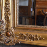 Nineteenth century monumental mirror in gilded wood