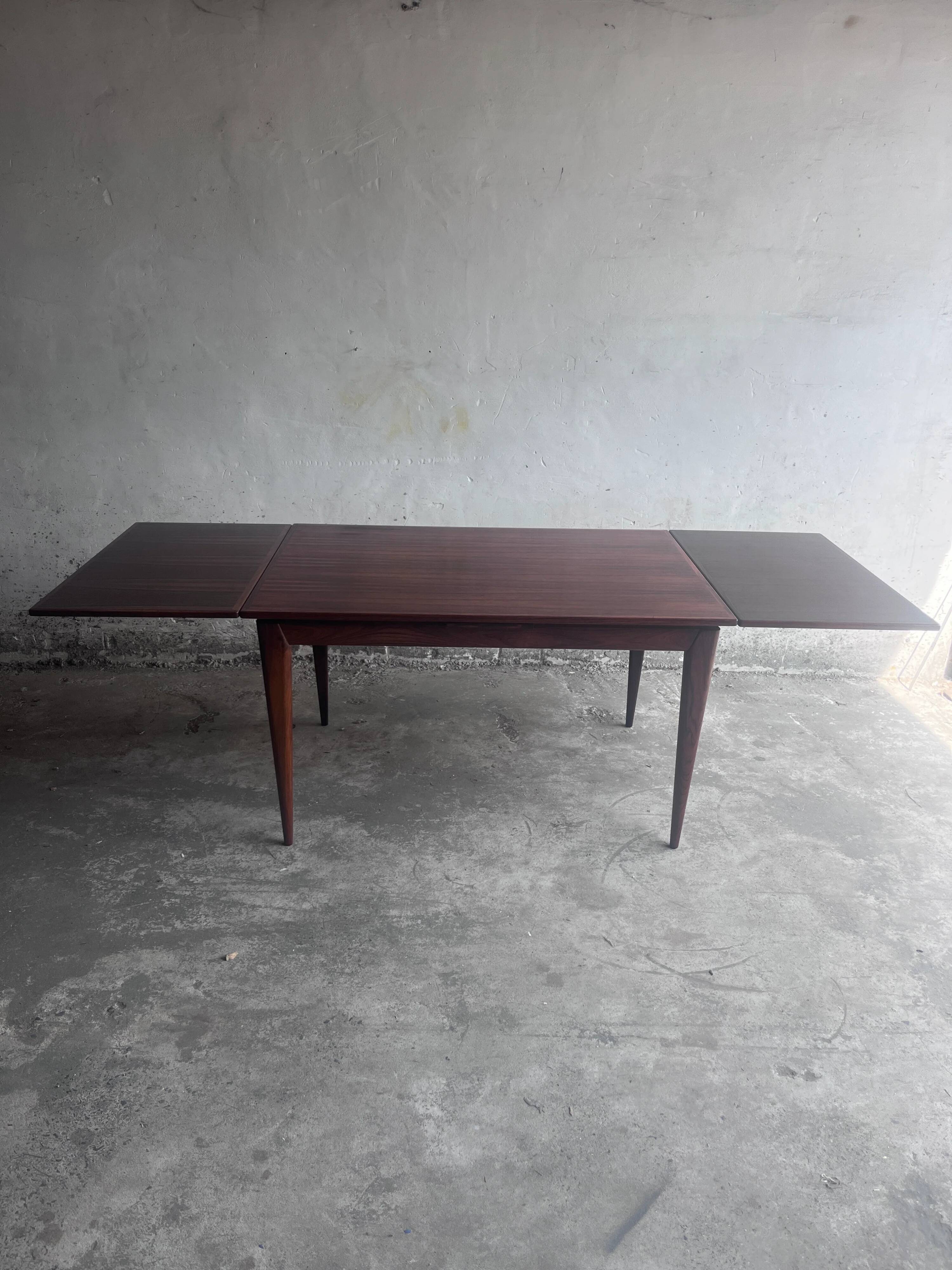 Danish extendable dining table in rosewood by Niels O. Møller, model 254, Denmark, 1960s.