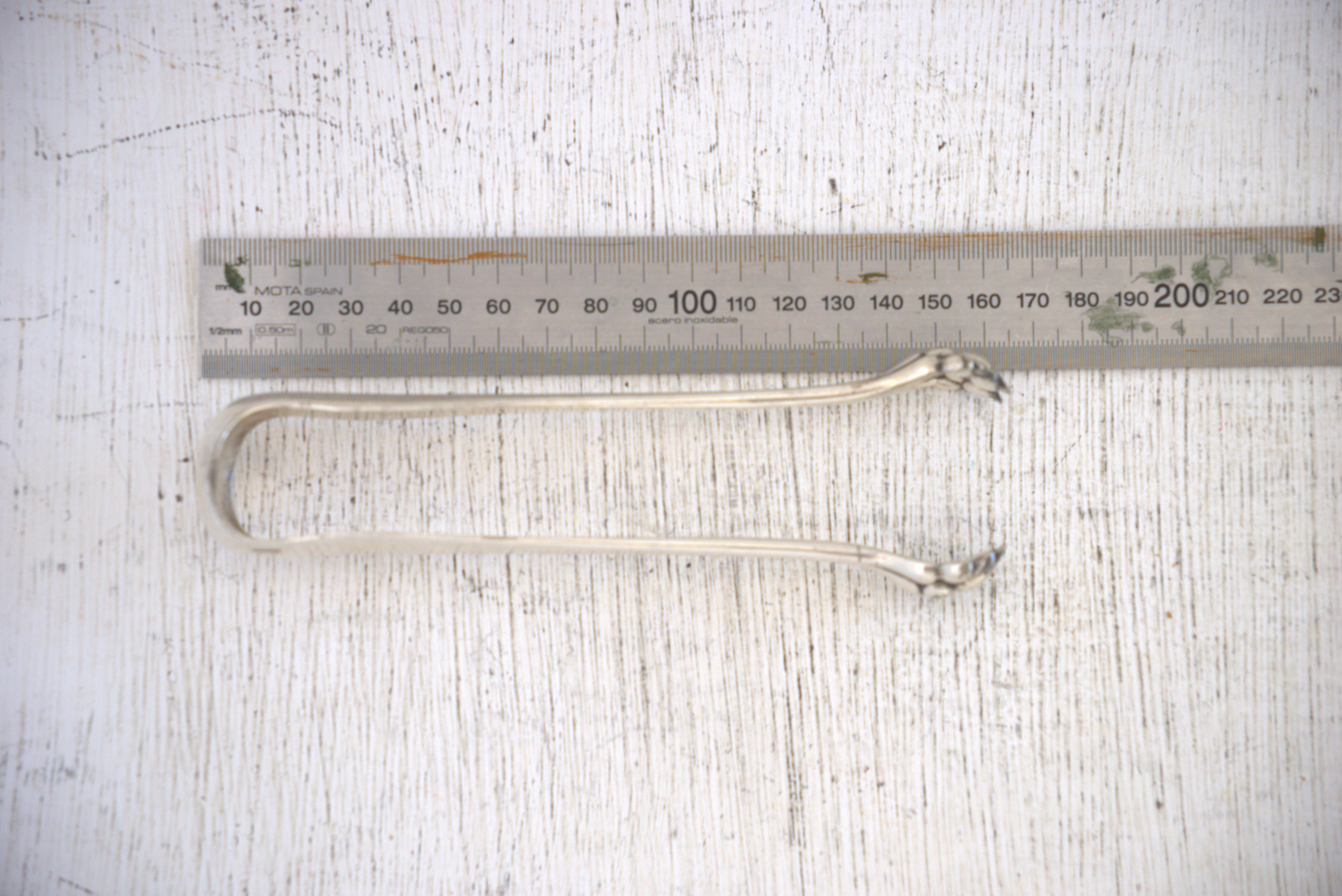 Silver metal candy box and pliers