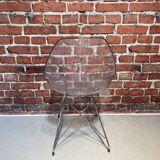 Suite of four plexiglass and metal chairs