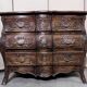 Curved tomb chest in the Provençal Louis XV style made of solid wood.