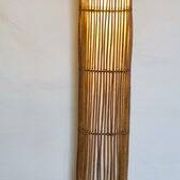 Mid-century rattan floor lamp, in the style of Louis Sognot.