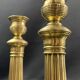 Pair of 19th century gilt bronze candlesticks with fluted shafts, Restoration