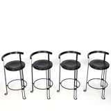 Four "Oblado" bar stools from the 80s