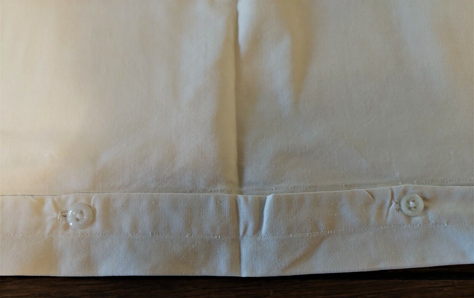 White cotton cushion or pillow case embroidered monogram and ruffle