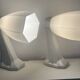 Pair of Art Deco wall sconces in ceramic and opaline.