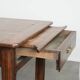 Antique French farmhouse table with two drawers and an extendable leaf.