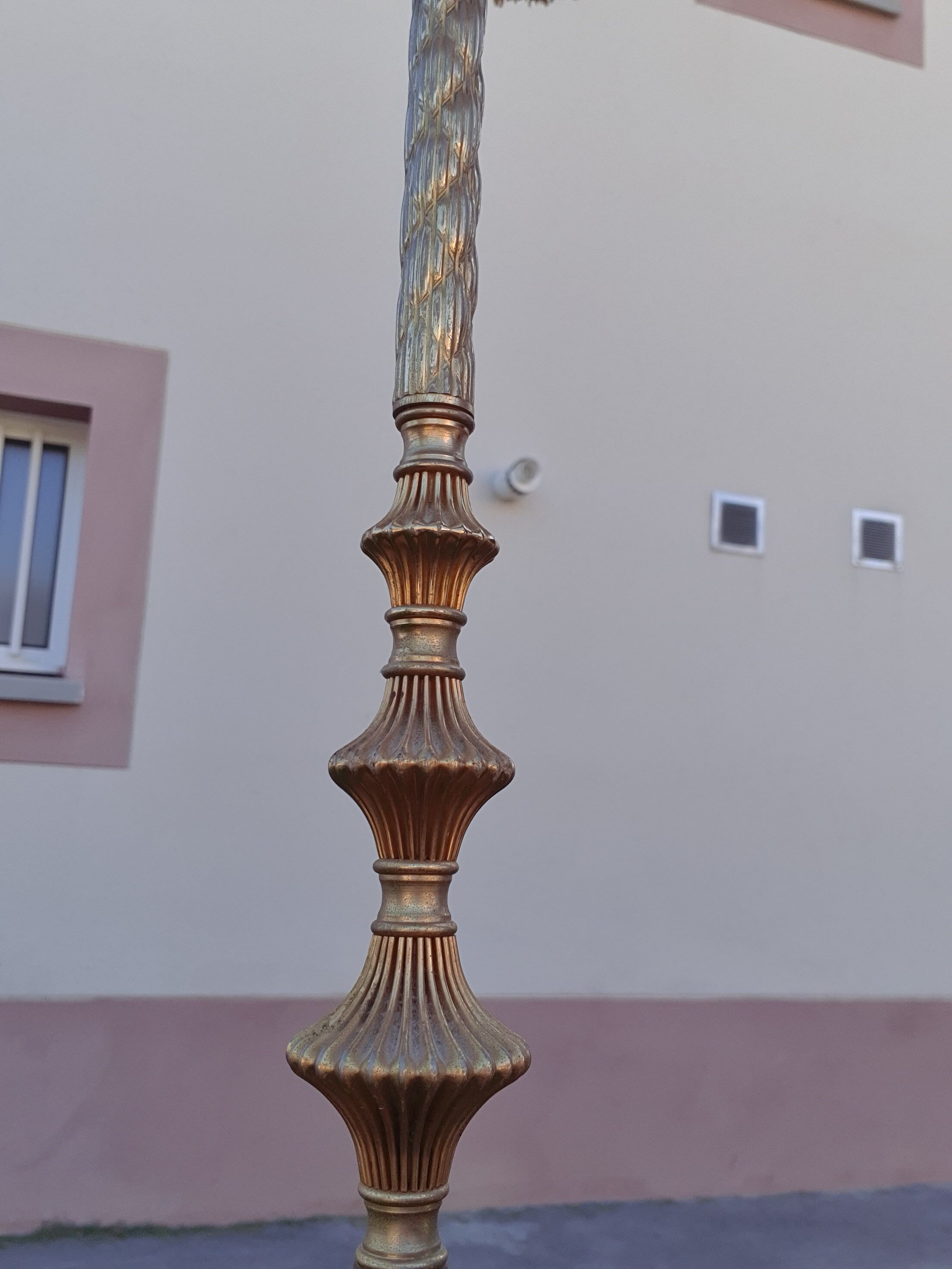 Twisted brass tripod floor lamp