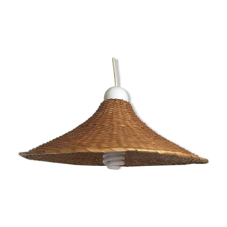 Braided wicker hanging lamp in the shape of a hat