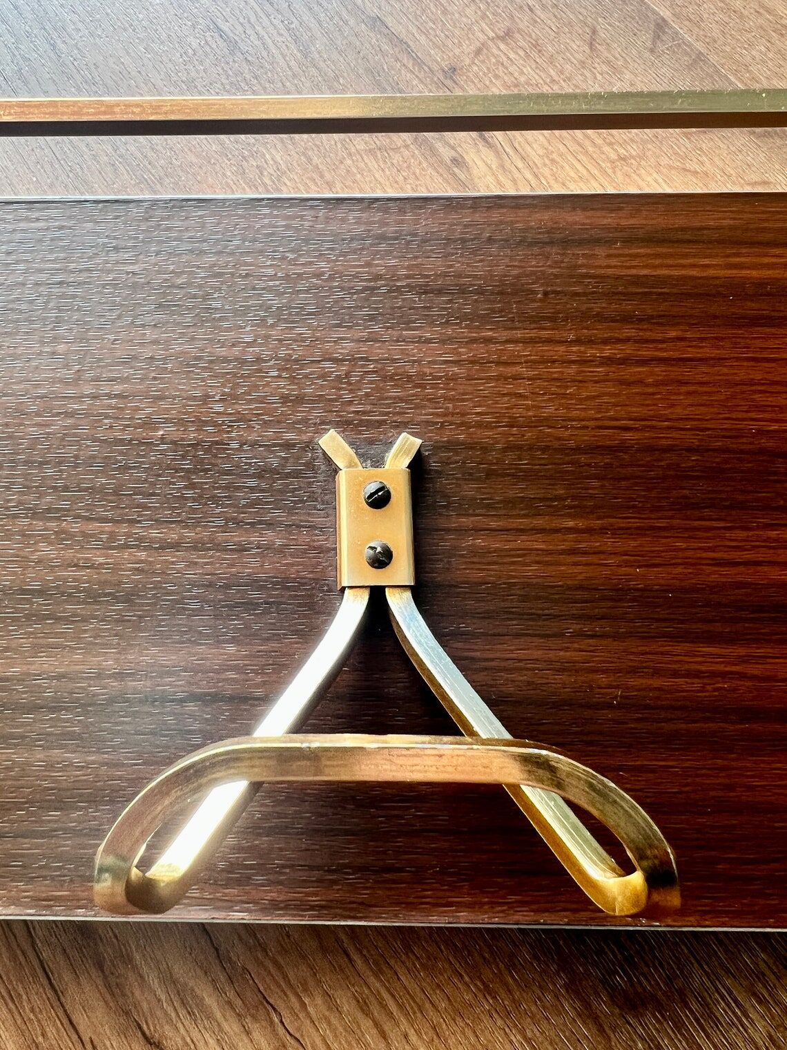 Vintage coat rack with 1970s repai décor