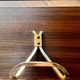 Vintage coat rack with 1970s repai décor
