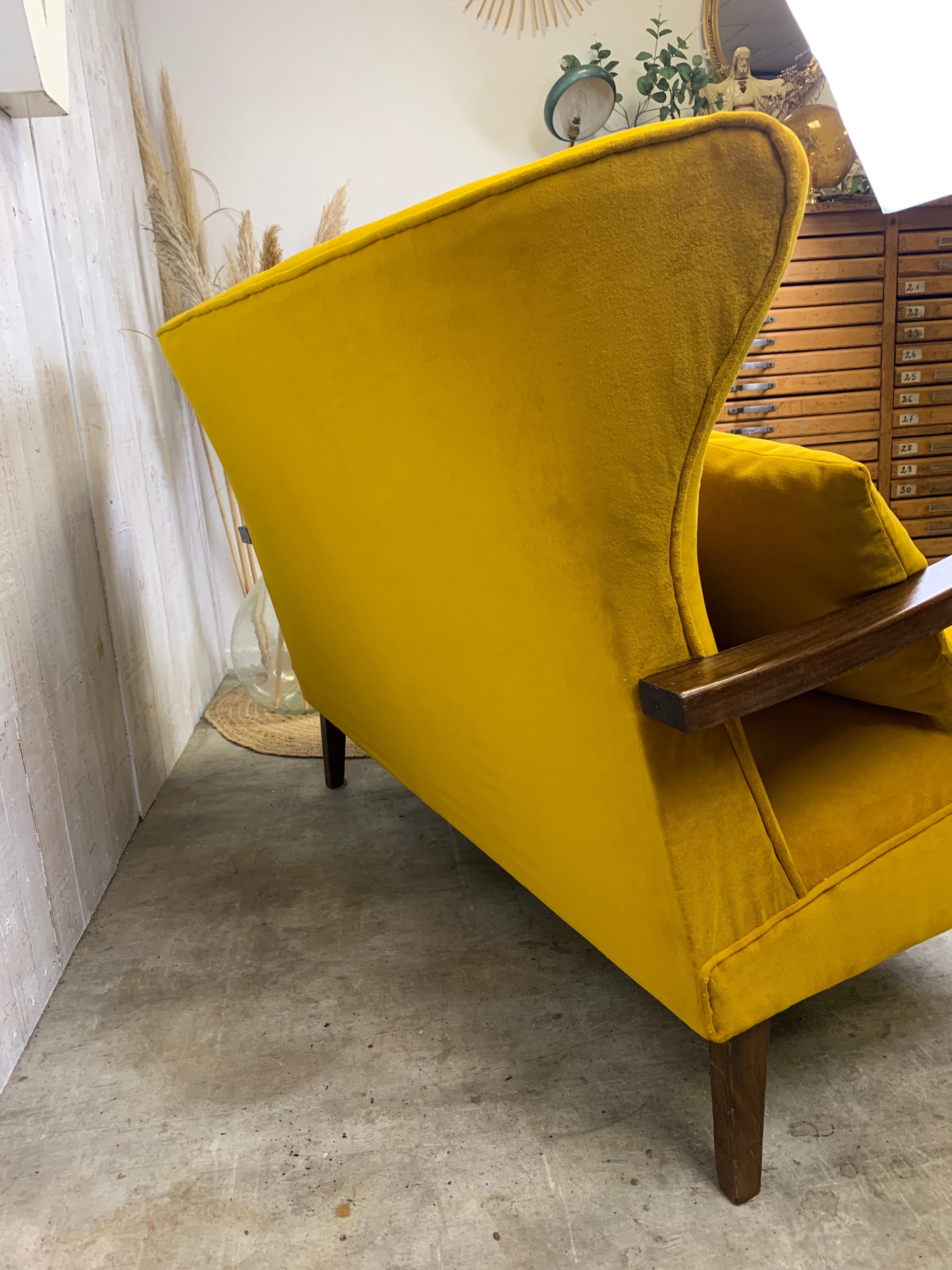 Yellow velvet sofa