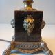 Large antique Empire style lamp in brown marble and bronze – heads of
