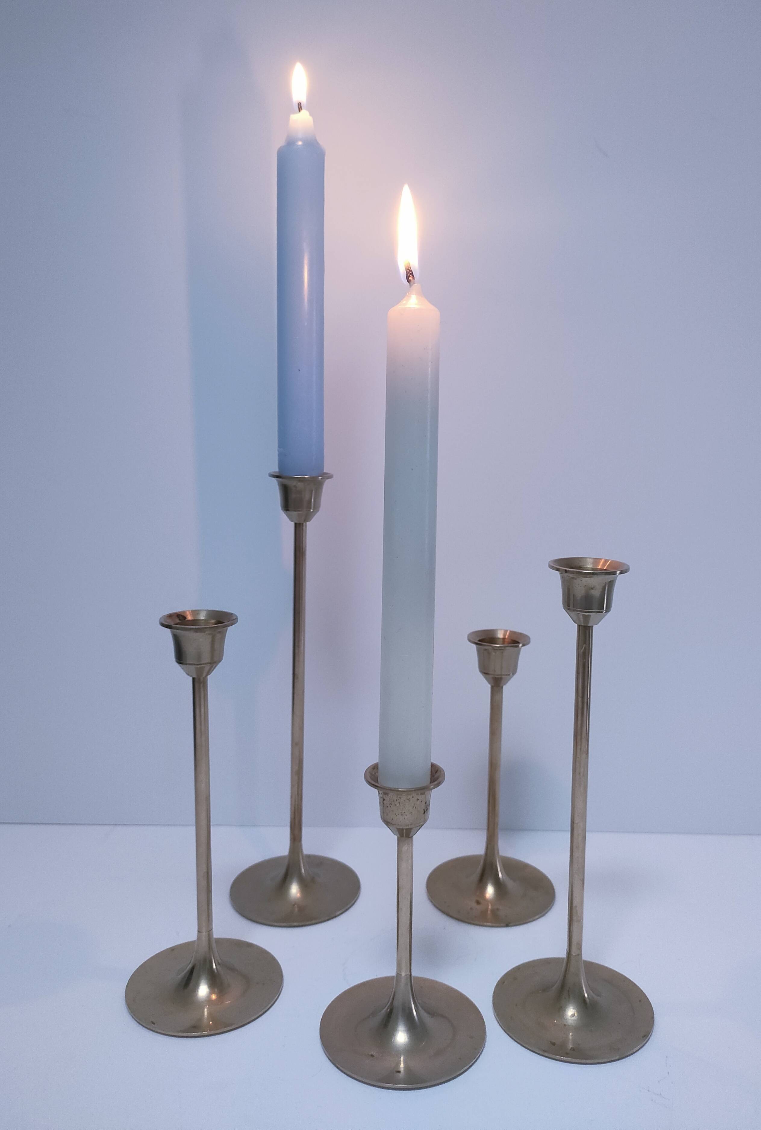 Five vintage Scandinavian design brass candlesticks