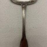 Silver metal sauce spoon